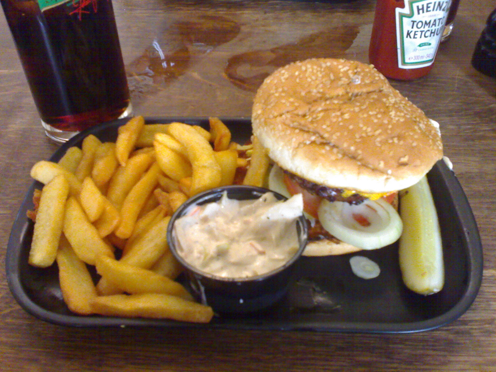 a sandwich and fries sitting on top of a plate