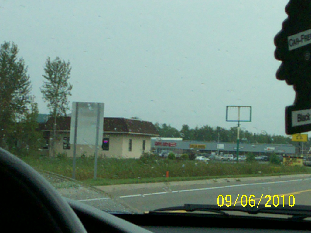 a close - up of the windshield of a vehicle in traffic