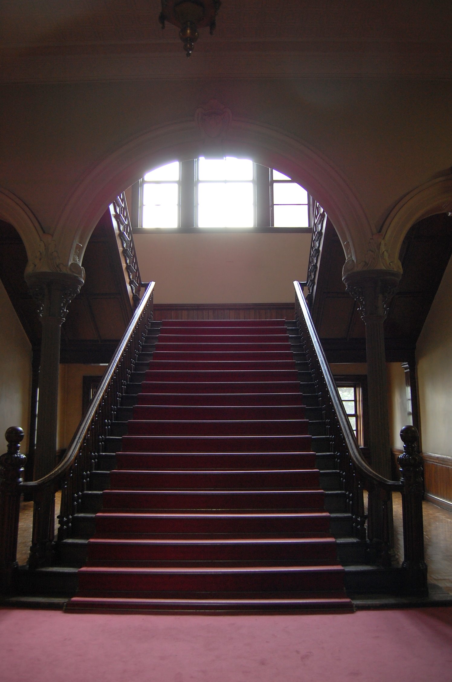 there is a set of stairs in a hallway