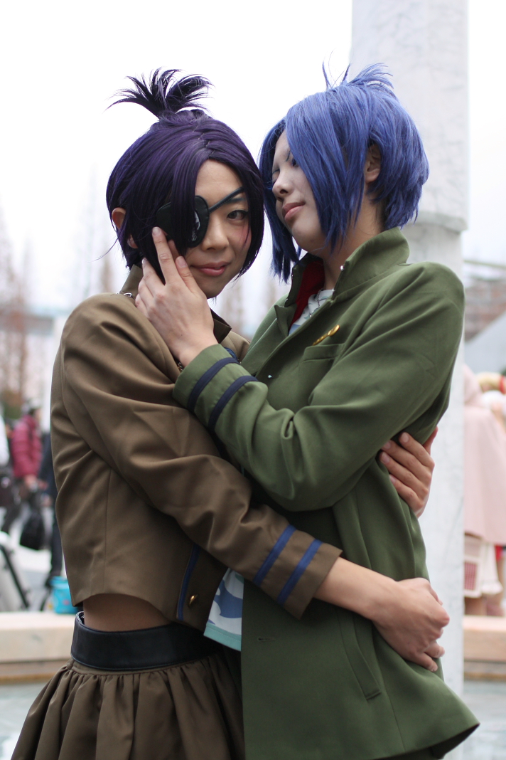 two male anime characters hugging each other