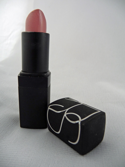 the lipstick is pink and red with a black cap
