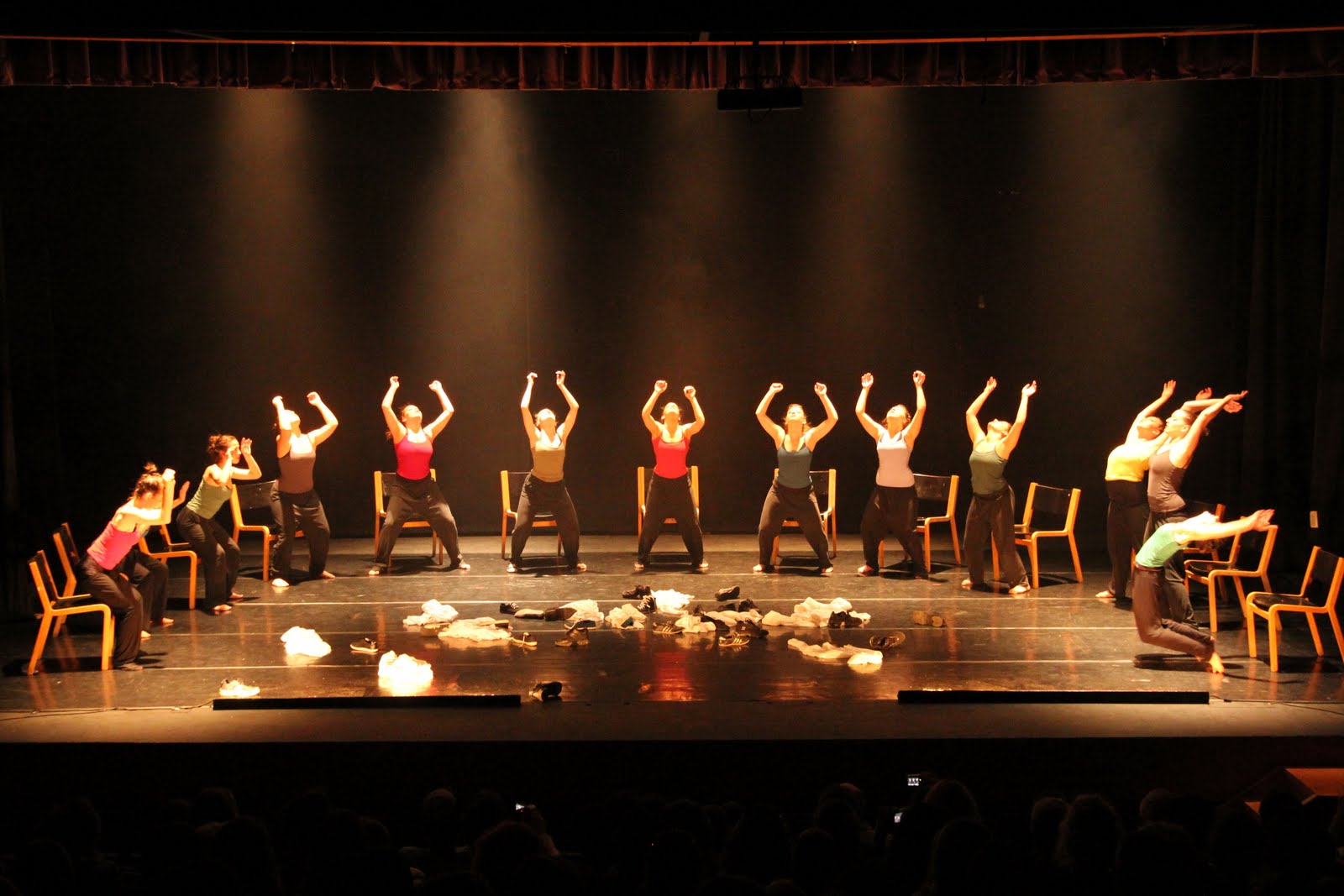 a group of people performing on a stage