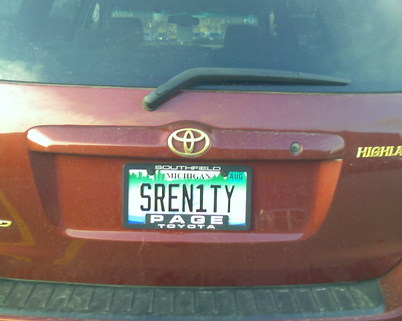 the license plate on the front of a car