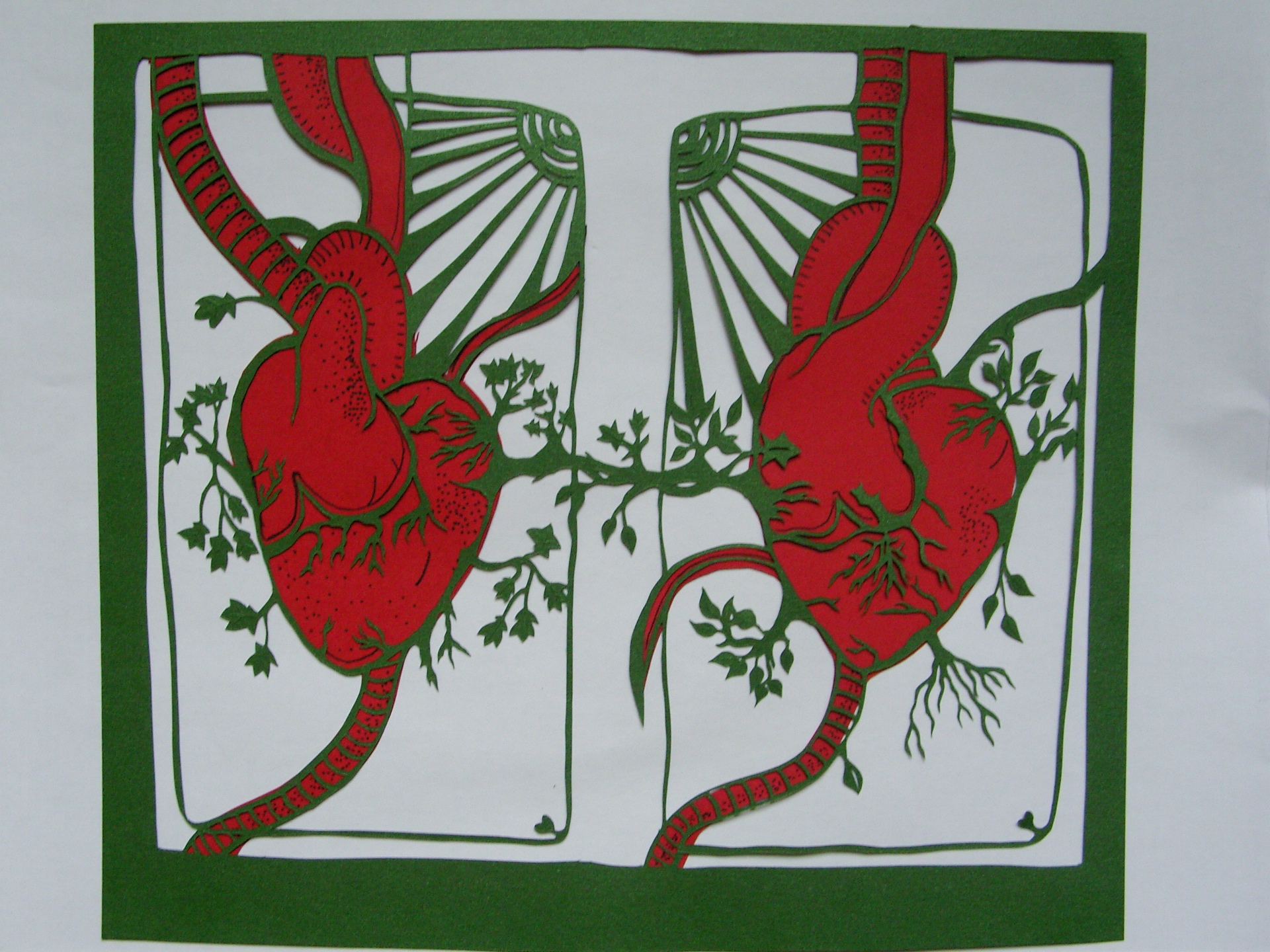 two red and green lizards are in a panel