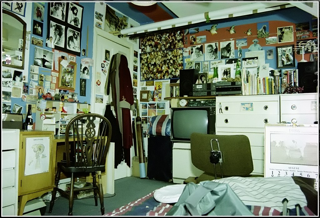 a room that has pictures and walls all over it