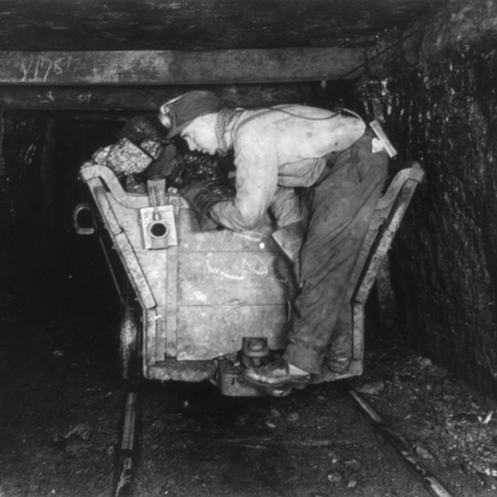 a man is working in a train tunnel