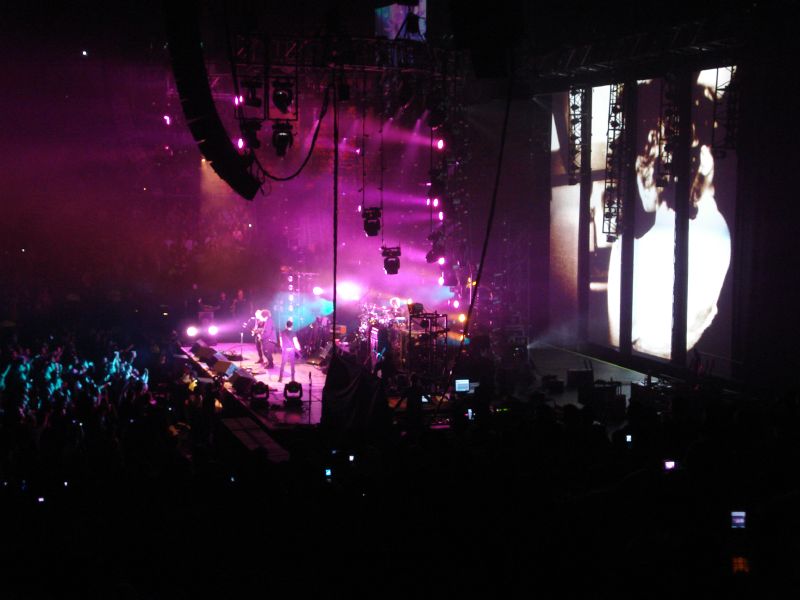 a music band performing on a large stage
