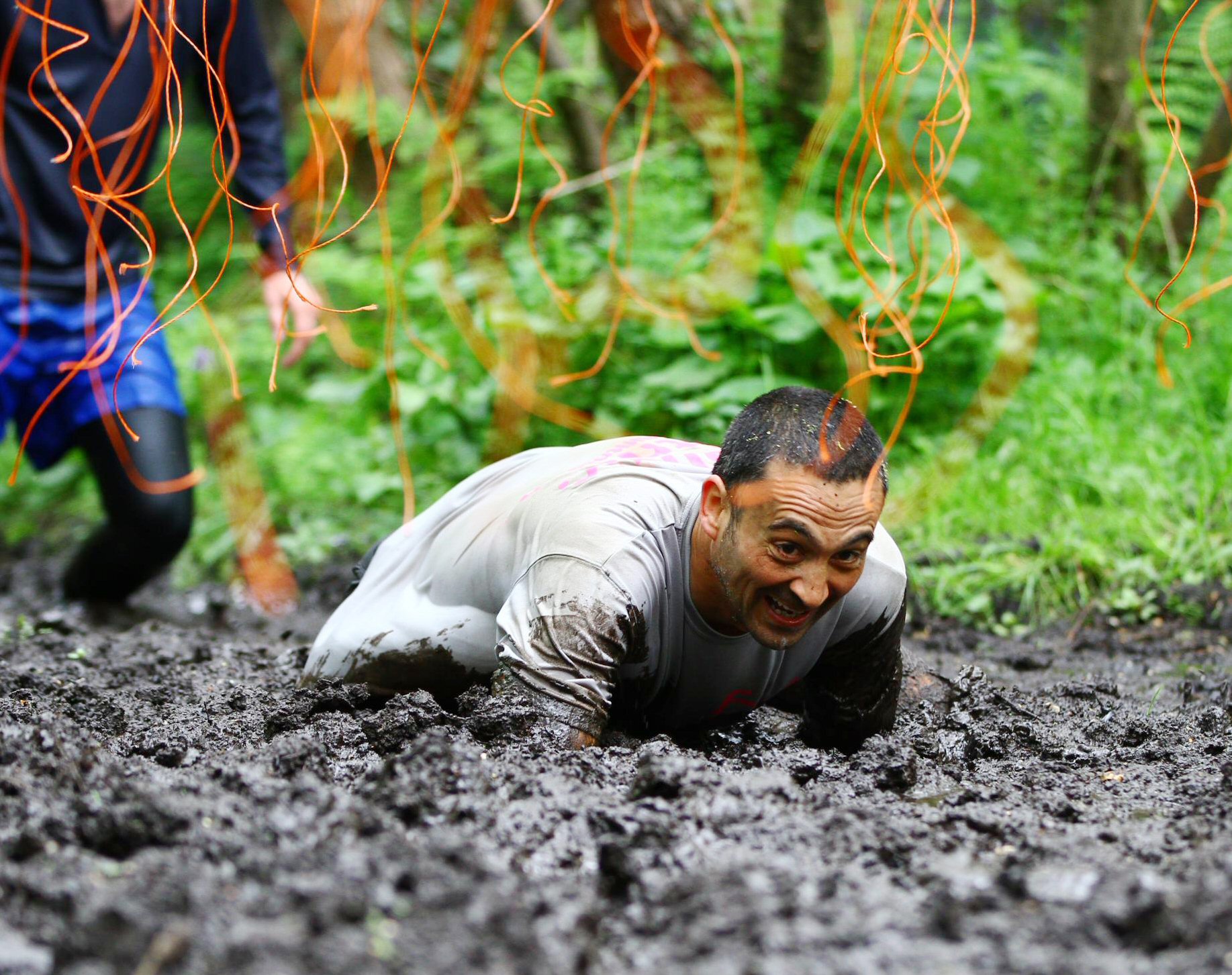 a man on his back in the mud