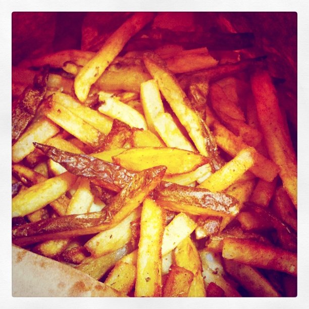 close up view of fries that is cooked and fried