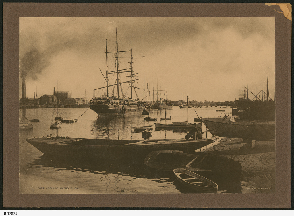 vintage po of sailing boats docked near pier