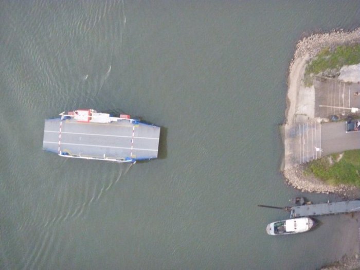 two boats in the water at a dock