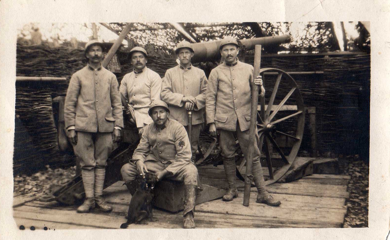 the group of men are posing together for a pograph