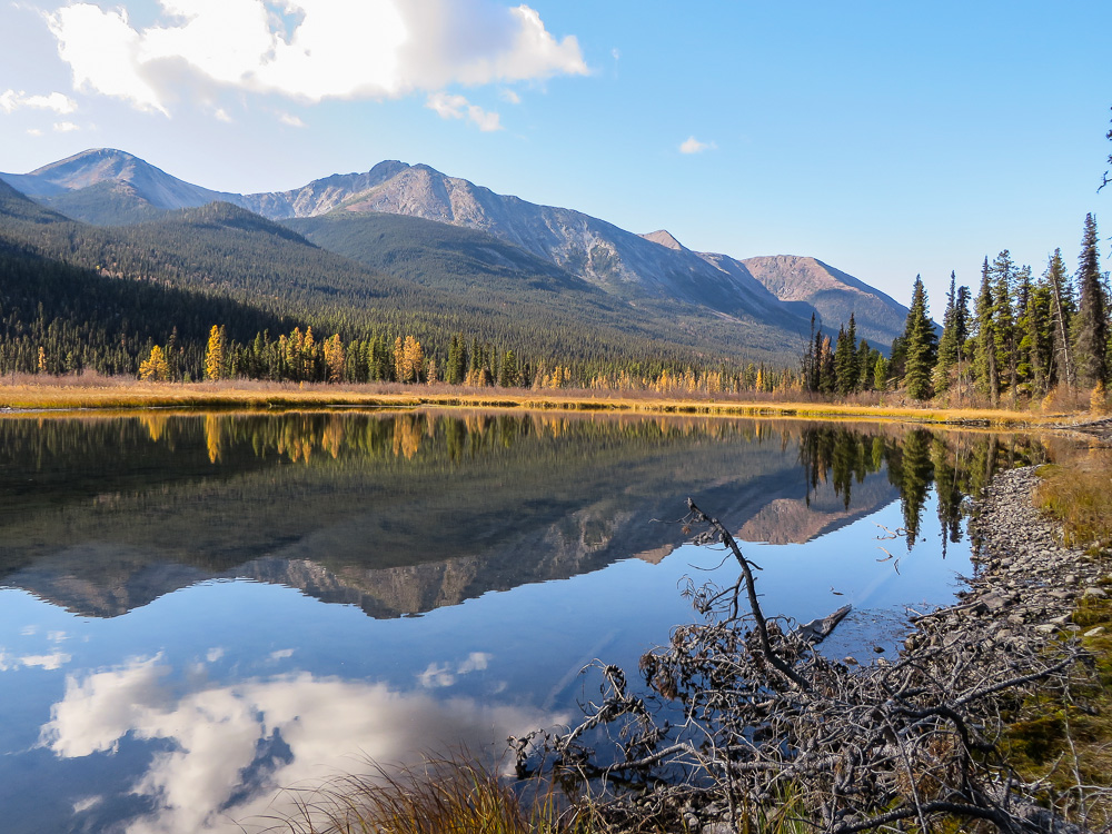 this is the mountains reflected in the lake