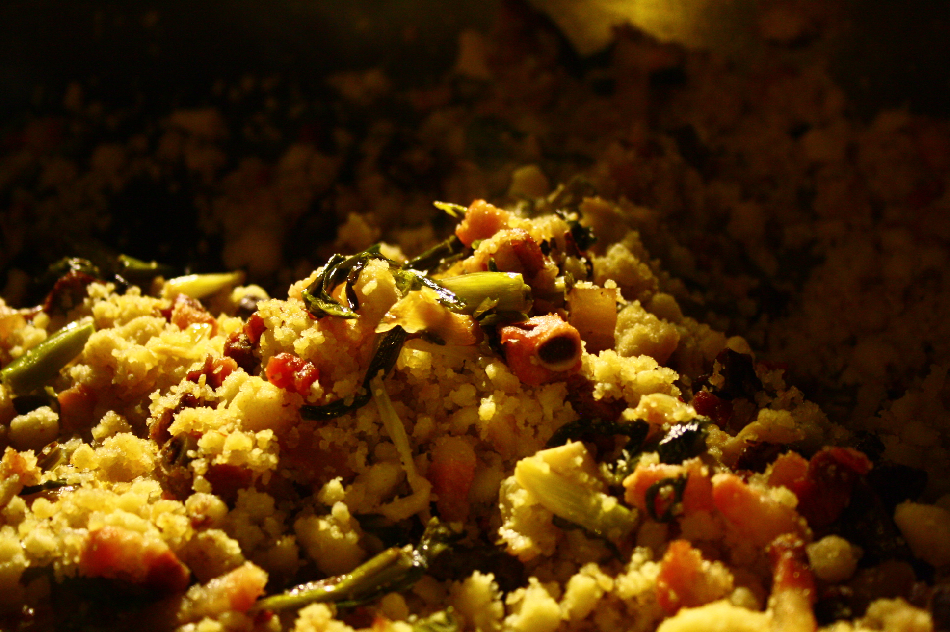 some cooked food and some spices in a pan