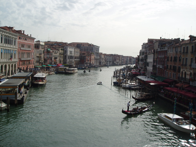 a waterway surrounded by buildings and small boats