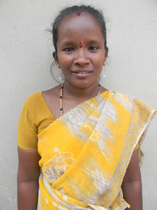 a woman wearing an indian outfit