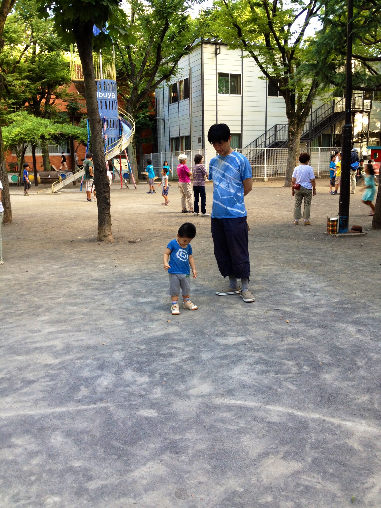 a  plays with an old woman on a playground