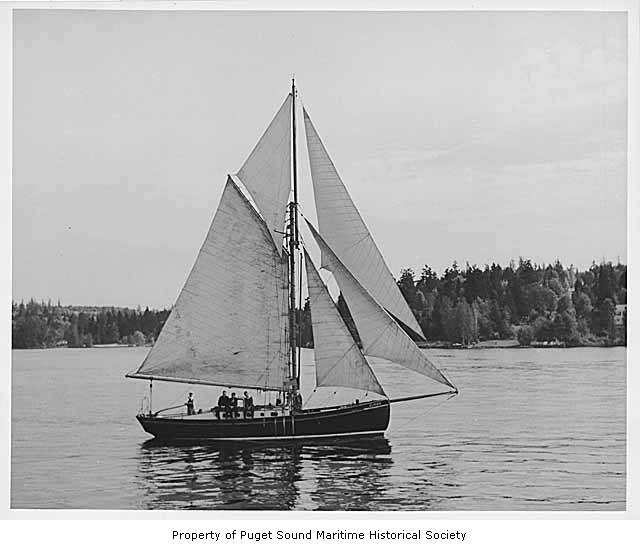 an old black and white po shows a sailboat