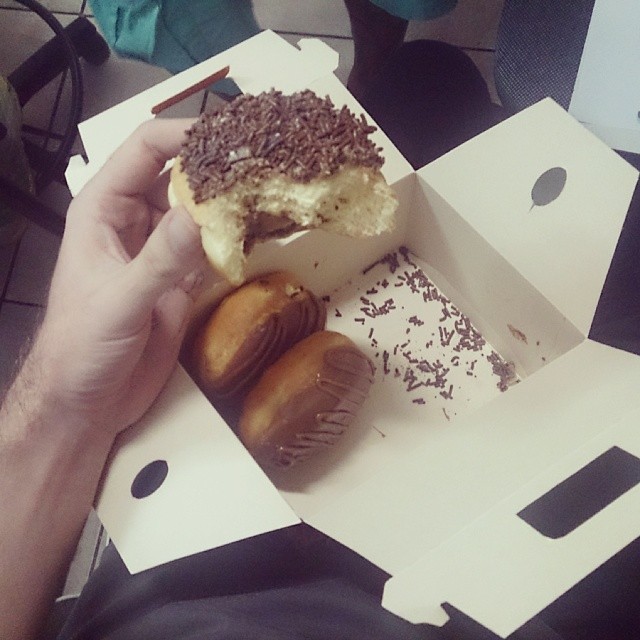 a white box with a donut and a doughnut inside of it