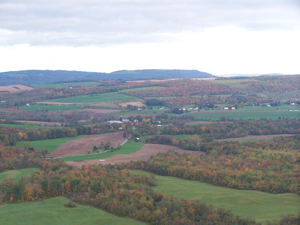 an aerial view of a valley in the distance