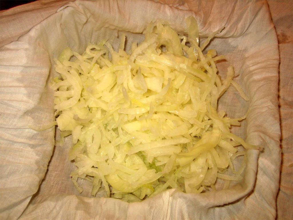 an image of chopped cabbage being prepared for dinner