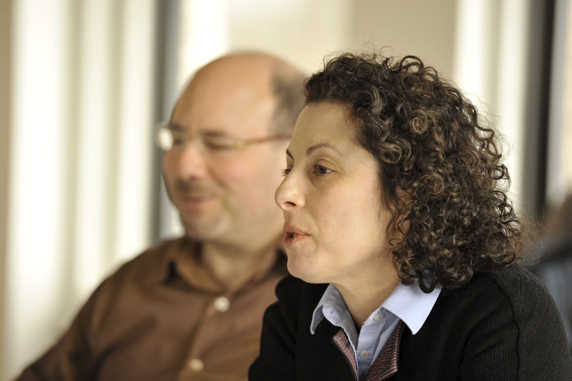 a man and a woman sitting next to each other