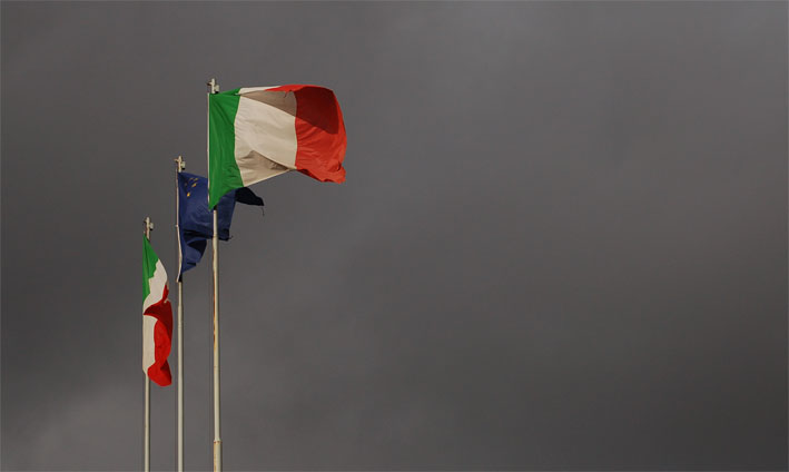 four italian flags with one being white and one red