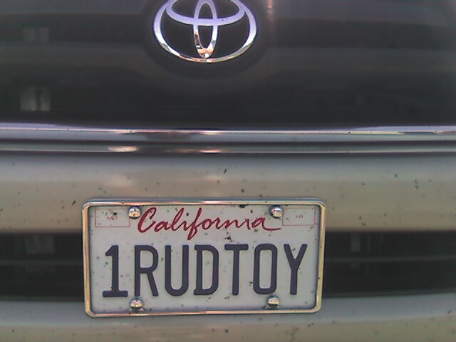 the front bumper of a car with a plate that reads toyota