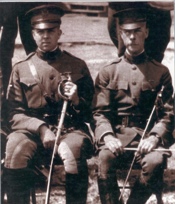 the two soldiers in uniforms are wearing helmets