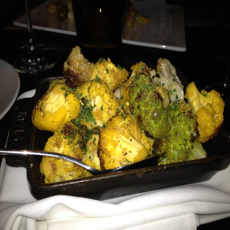 a platter full of broccoli and cauliflower