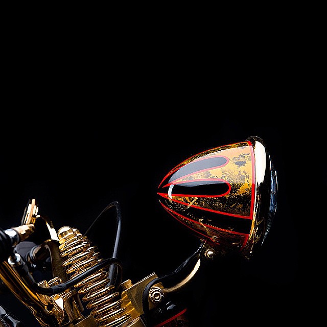 a close - up of a motorcycle with colorful accents