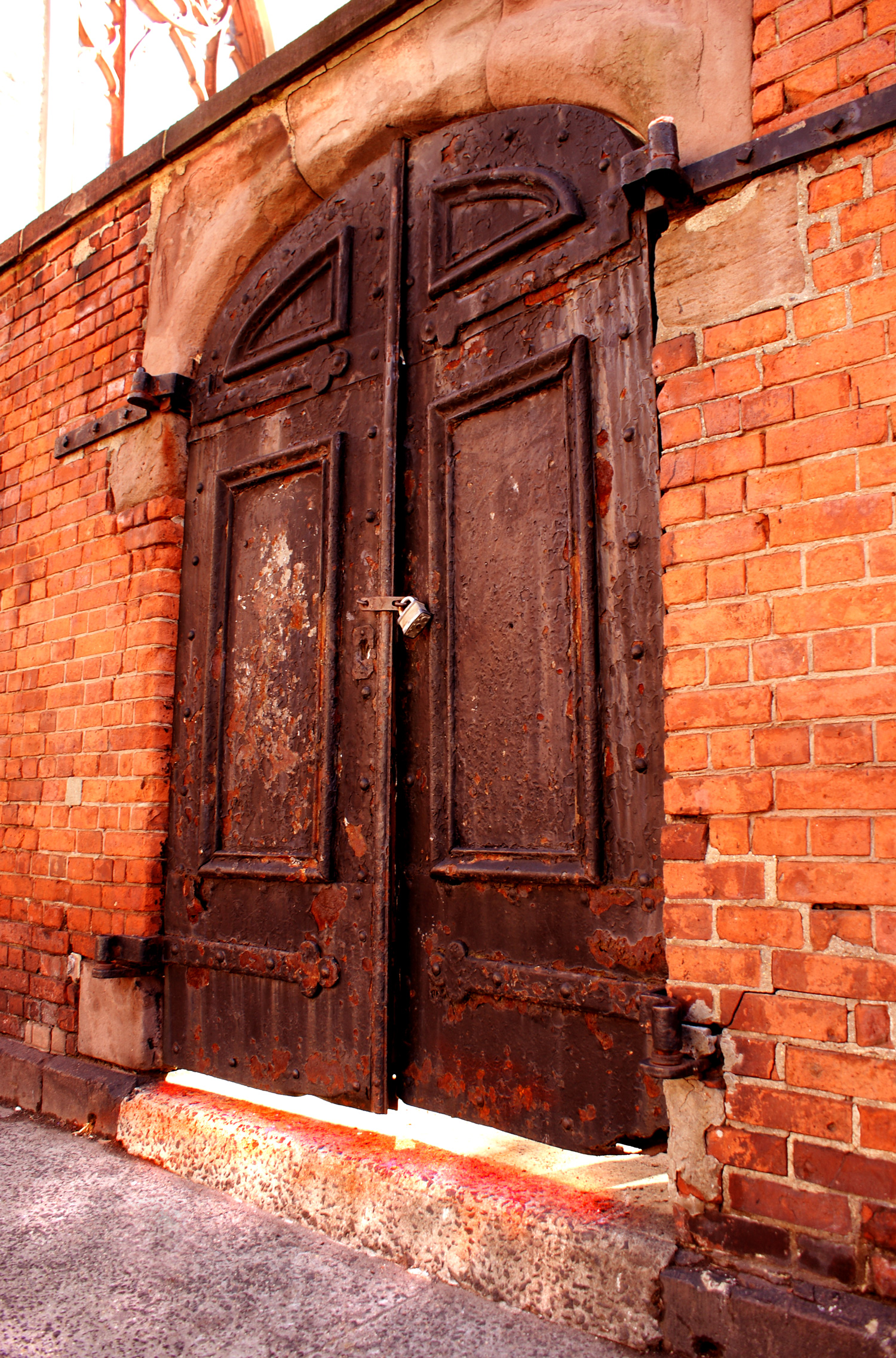 the outside door to the building has a circular top