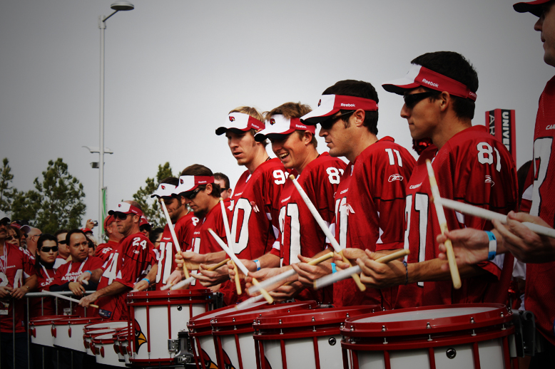 the drummers are playing with their drums