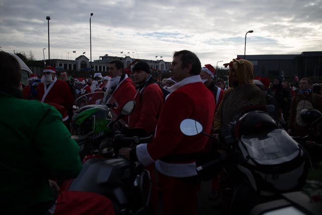 a group of people dressed up in christmas costumes