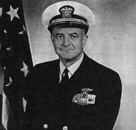 a black and white po of a man in a navy uniform
