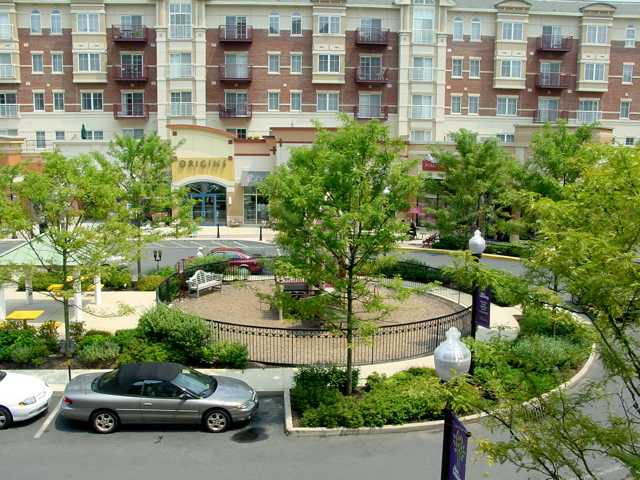 there is a parking lot where cars are parked