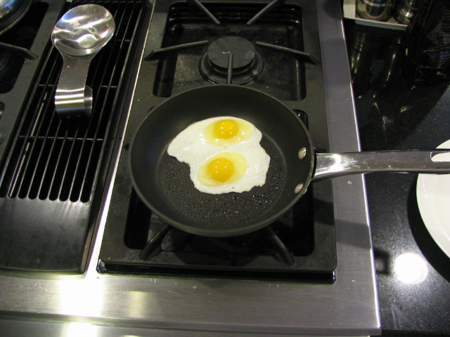 the eggs are fried on the frying pan