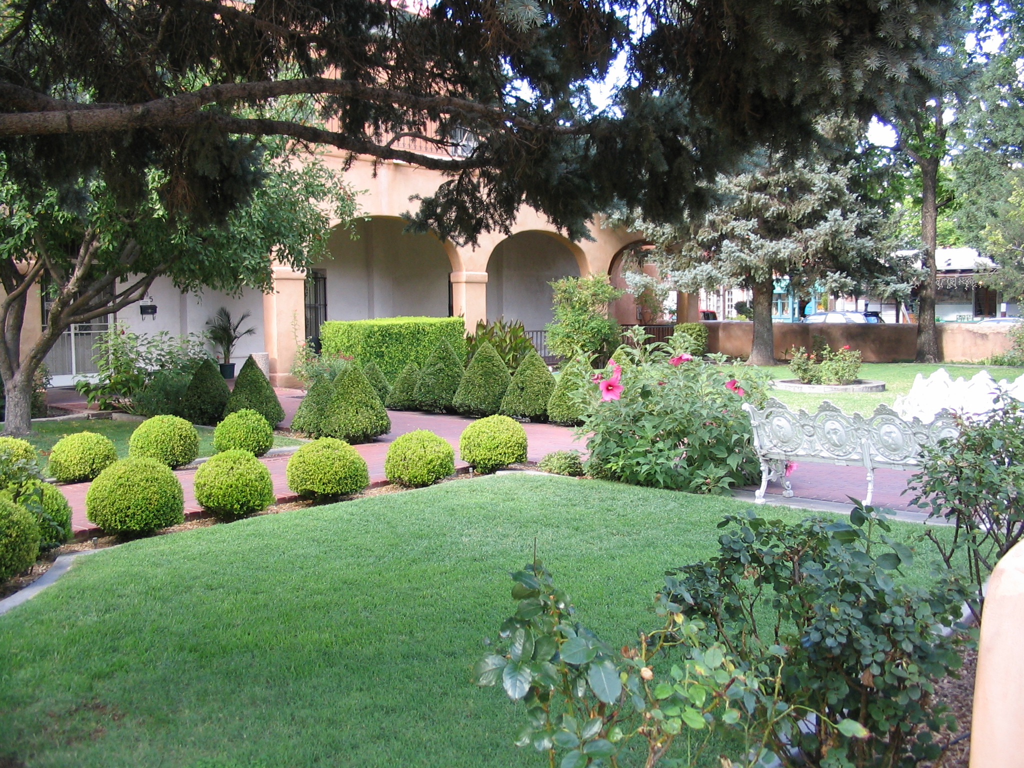 a view of a nice building from across the yard