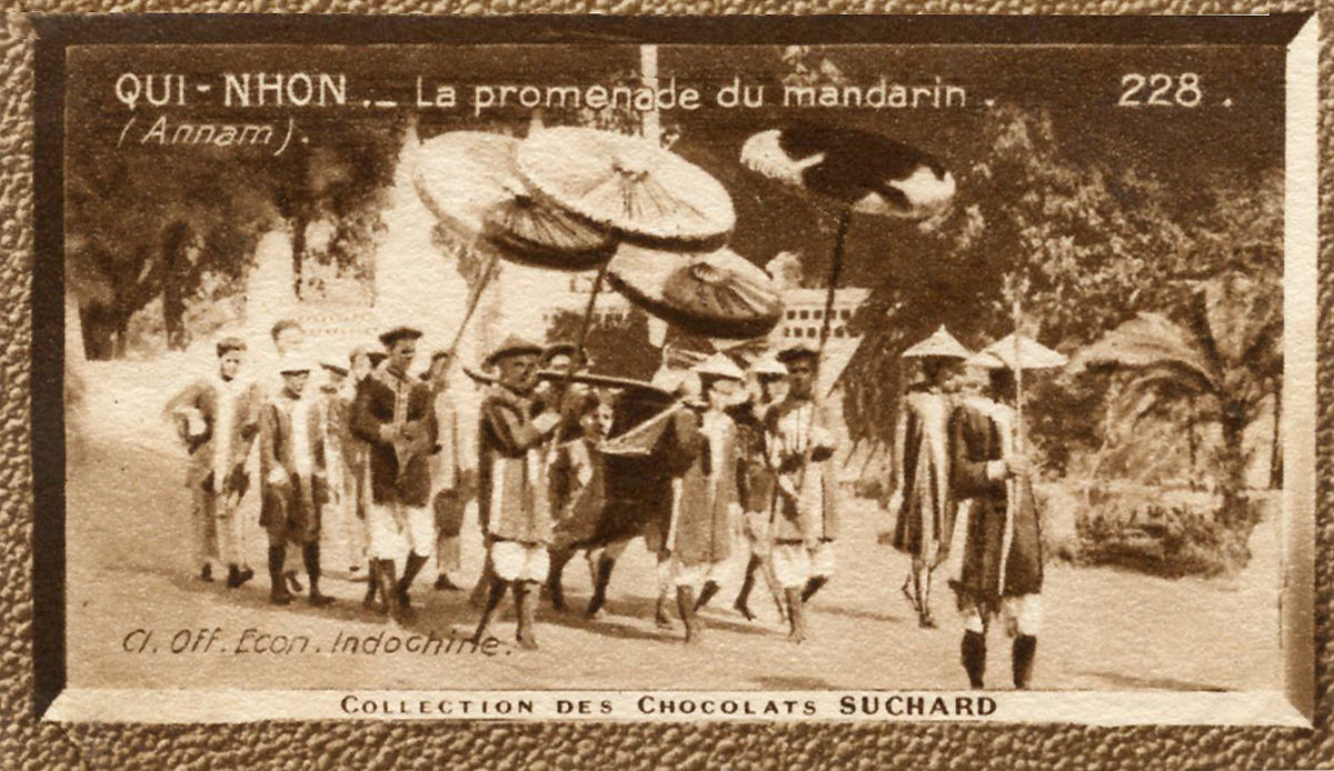 a group of men are walking on a road