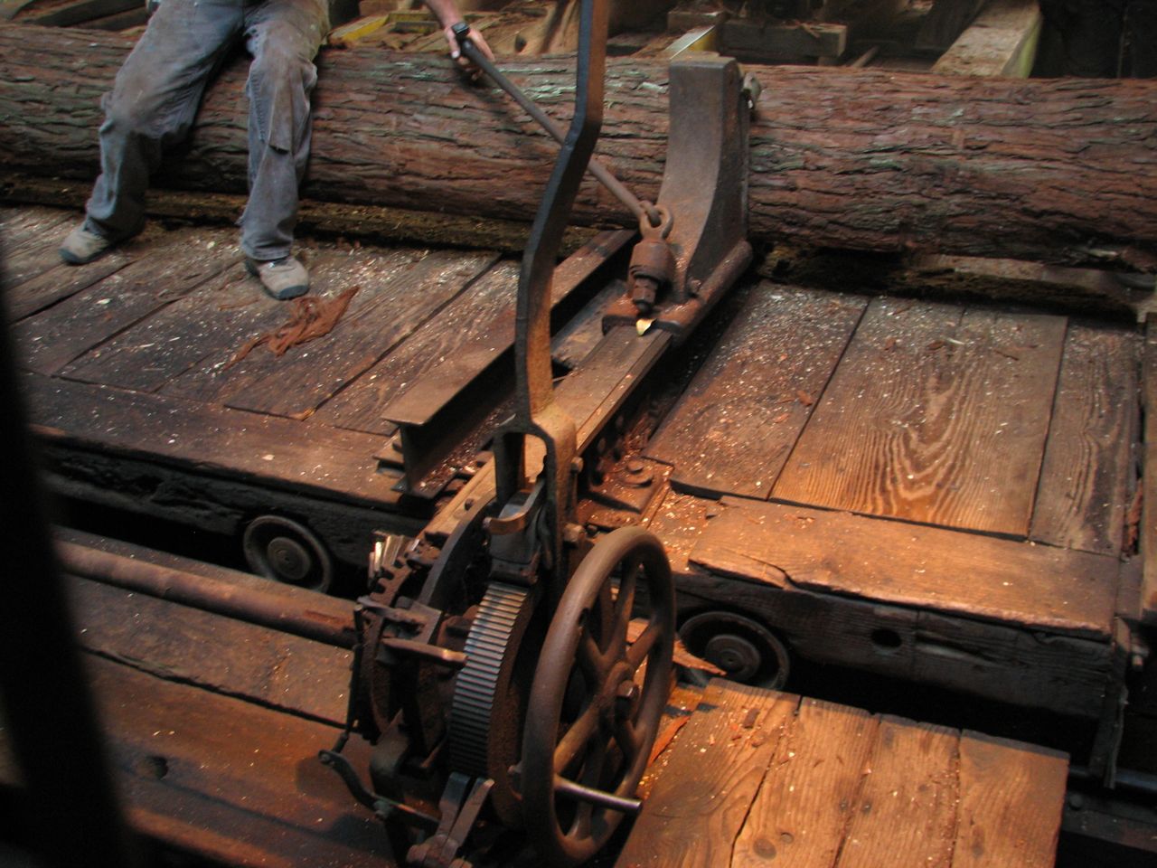 an image of a man working on wood