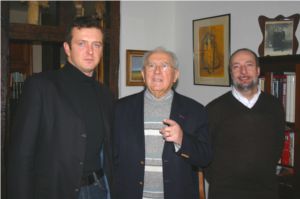 two men and an older man posing for a picture
