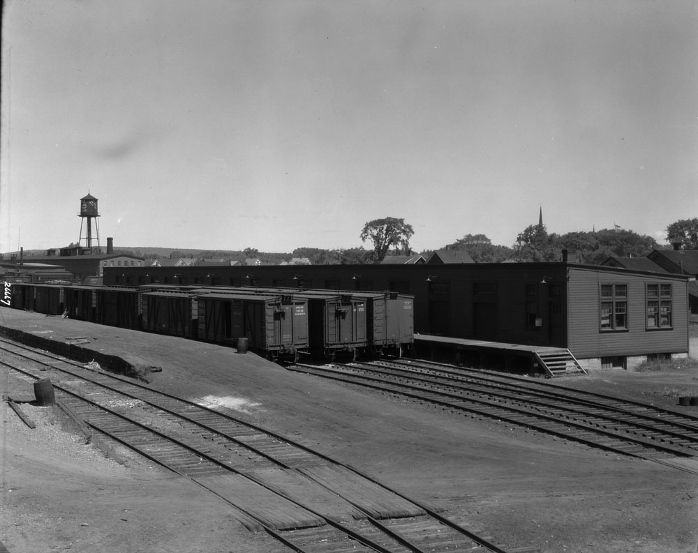 an old po of some railroad tracks and buildings