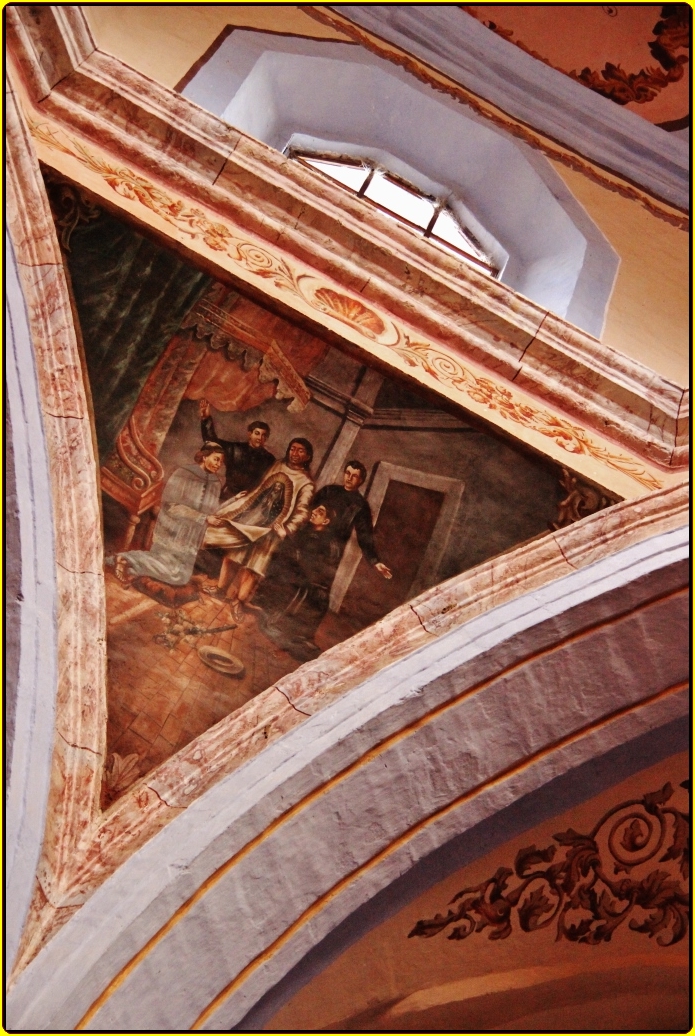 some paintings on the ceiling and ceilings and a building