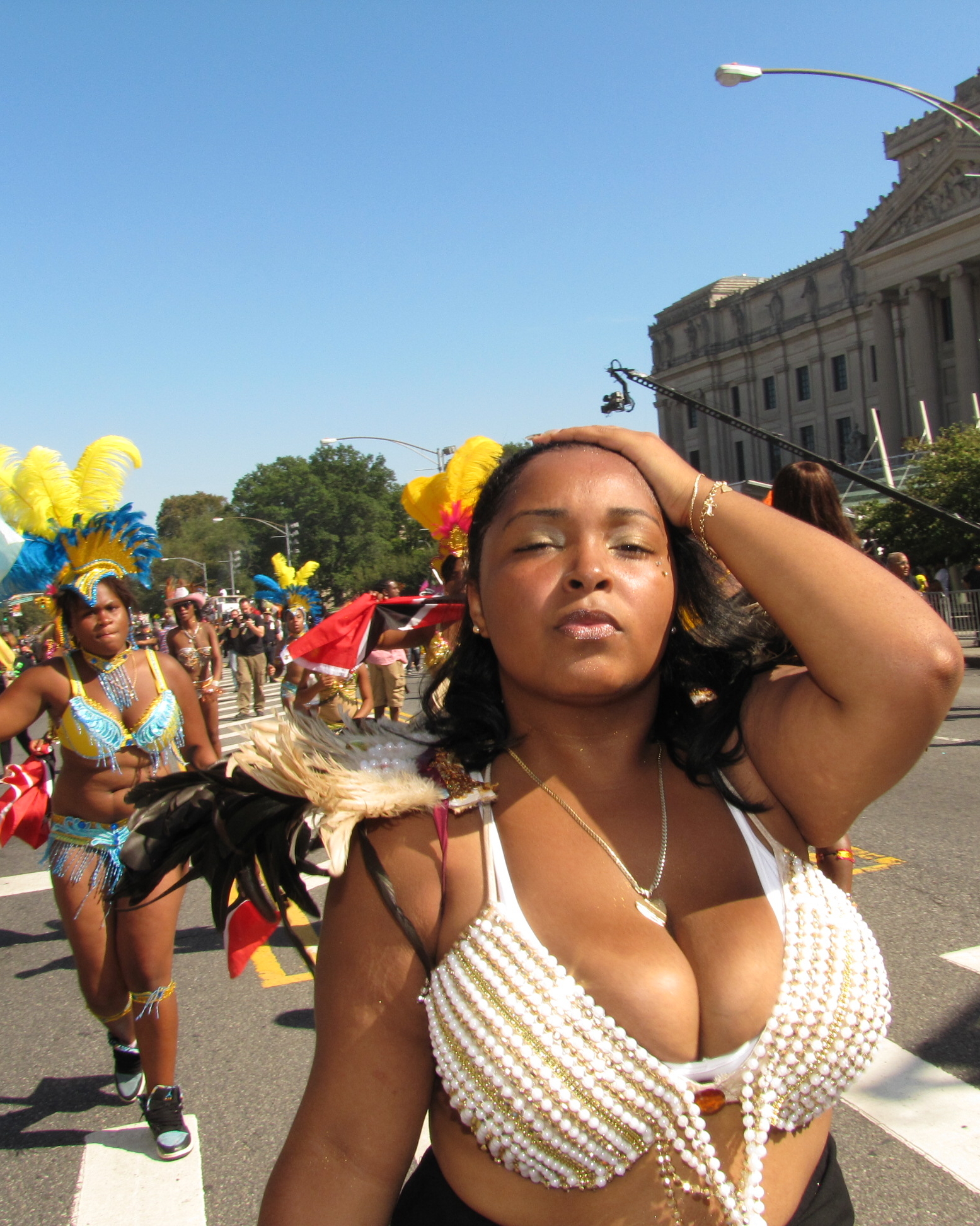 woman dressed up in costumes dancing and dancing on the street