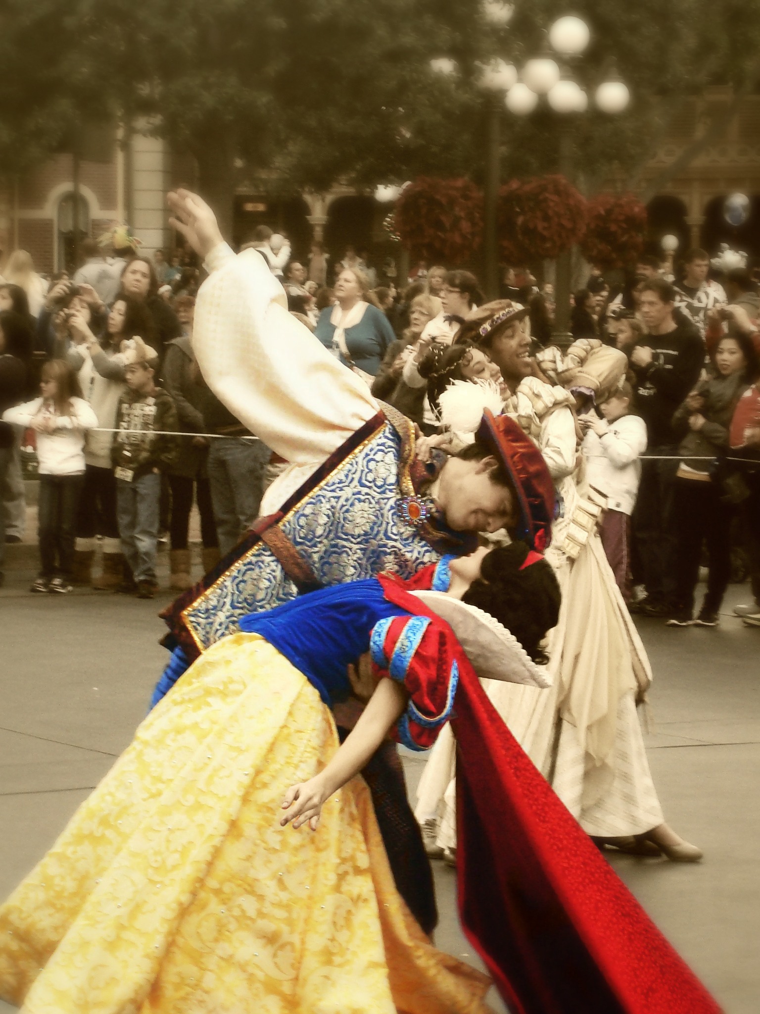 people dressed up as snow and two girls on the street