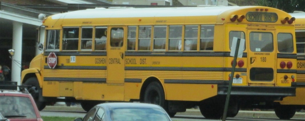 a school bus sits parked on the street