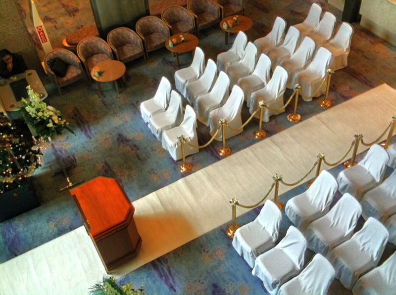 chairs line the aisle at a very nice looking ceremony