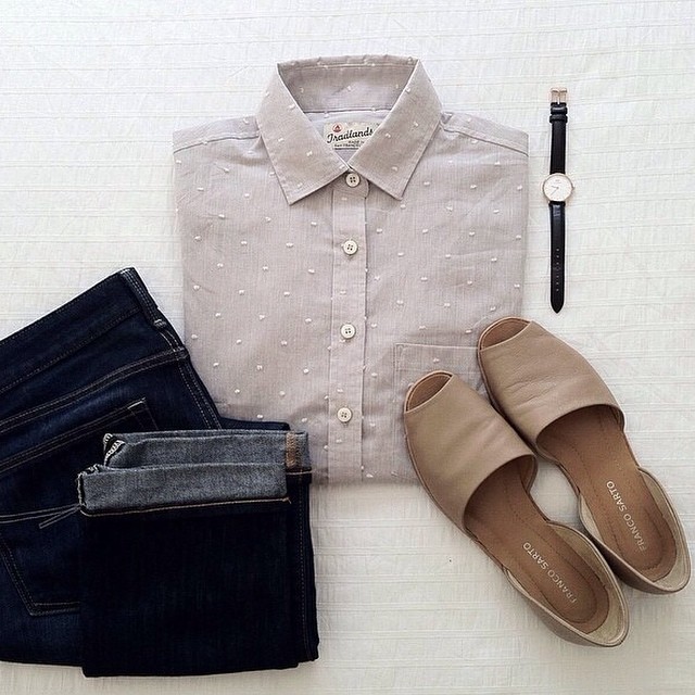 a shirt, jeans and shoes with a pen
