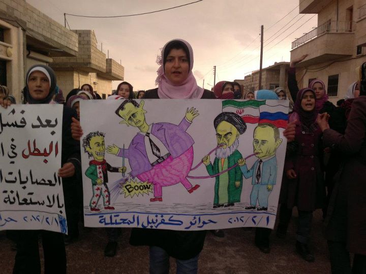 a group of people holding protest signs while standing in the street