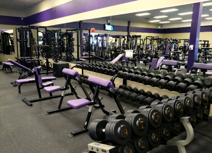 an indoor gym with a wide variety of weight machines